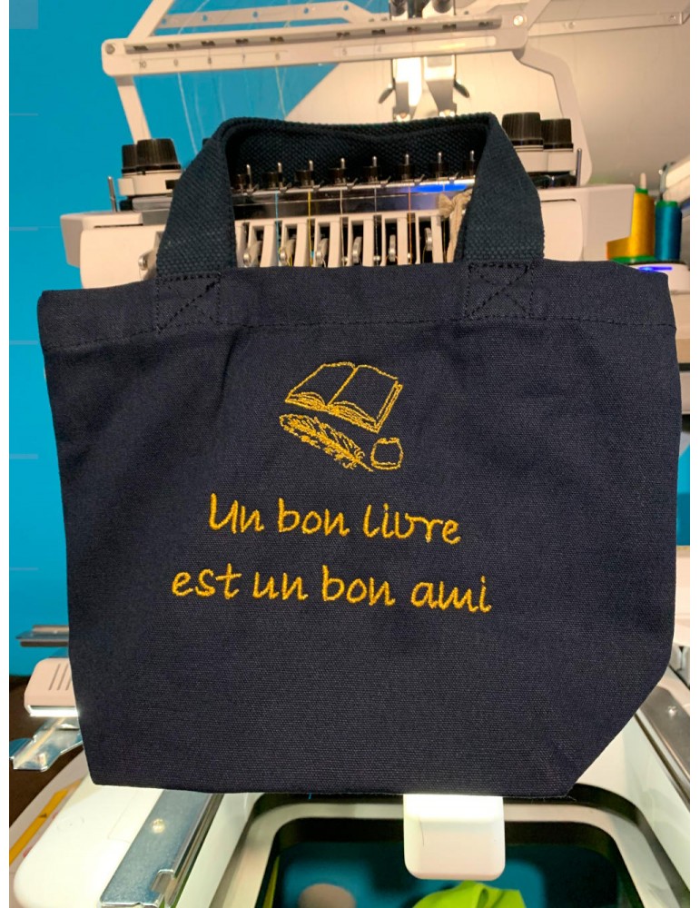 mini tote bag bleu marine personnalisé avec motif livre et texte