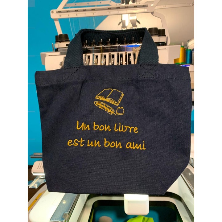 mini tote bag bleu marine personnalisé avec motif livre et texte