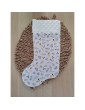 Botte de noël blanche à motifs noirs et dorés à personnaliser