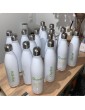 Gourde blanche personnalisée entreprise et individualisée au prénom des collaborateurs
