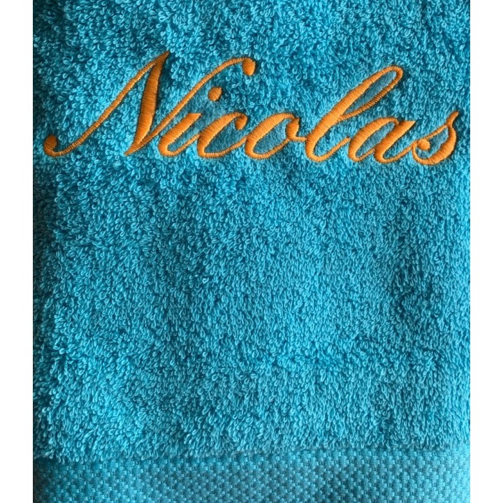 Serviette bleu océan personnalisée prénom Nicolas